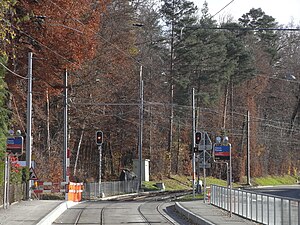 Double-tracked railway line with side platforms