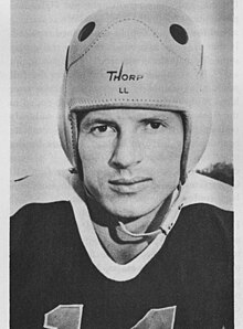 Black and white portrait of Hutson in uniform